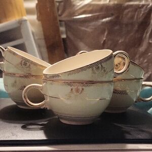 Elegant Gold and Cream Teacup Set Of 7